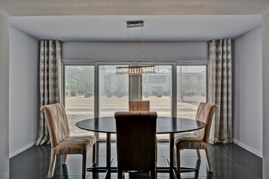 DINING AREA WITH DOOR TO PATIO