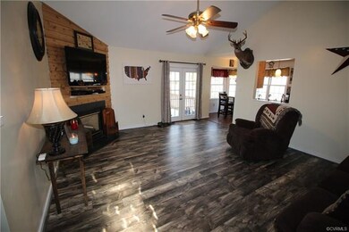 Family room as seen from near the front door.  Fre