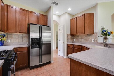Kitchen with view towards passage to Formal Dining