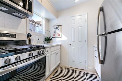 Kitchen is nicely updated with full sized applianc