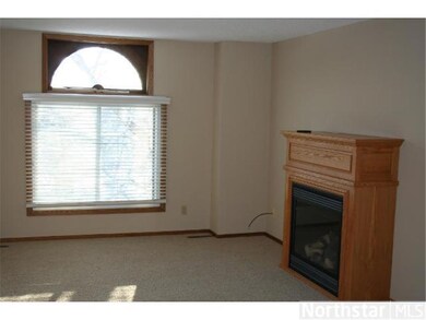 Upstairs living room offers a large window to brin