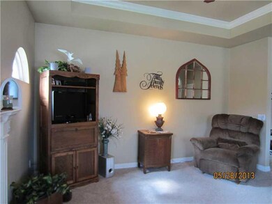 Living Room. Soaring ceilings w/ crown moldings, g