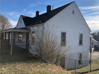 View of home's exterior featuring a chimney