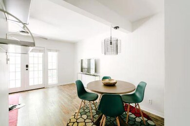 Dining room with baseboards and wood finished flo