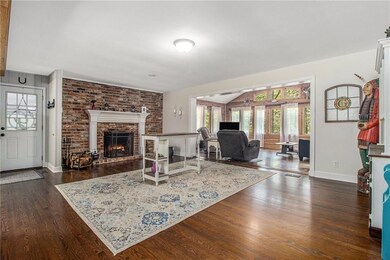 Flexible room with wood burning fireplace.