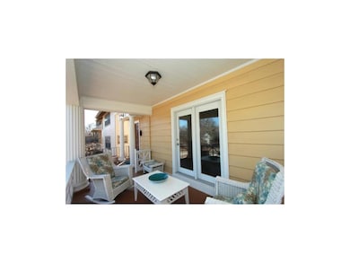 A wonderful front porch to enjoy the pretty weathe