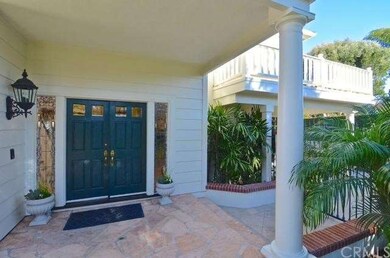 Beautiful multi-columned porch with double doors i