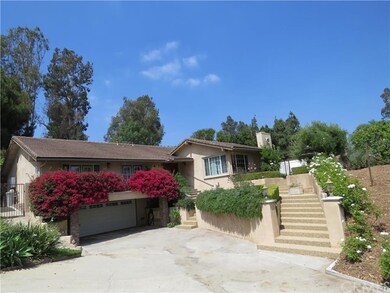 Single level home sits on top of garage.