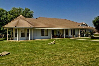 covered wrap around porch from front