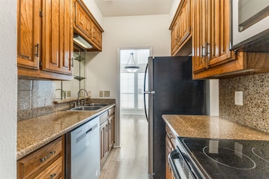 3909 Rawlins St unit 108, Dallas, TX 75219 - photo 6