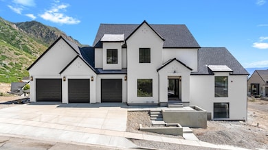 French country home featuring driveway, brick siding, roof with shingles, and an attached garage