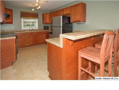 Nice, updated kitchen with tile countertops and li