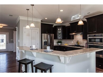 Photo of another Cypress kitchen. Granite countert