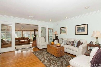 Living Room Area and Enclosed Patio