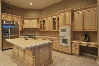 Stunning kitchen with alderwood cabs.