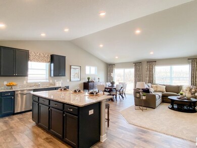 You can see the open-concept main level at work he