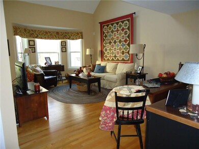 The living room has hardwood floors,...