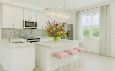 white kitchen with lots of space to cook aReimagin