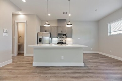 9 X 8 Dining room to the right as well as half bath to the left
