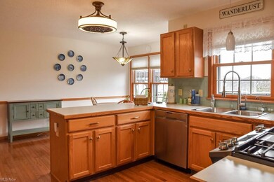 Beautiful hardwood floors in the kitchen and dinet