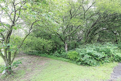 View of yard with a forest view
