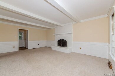 Family room with access to half bath, laundry, gar