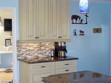 Kitchen. The beverage bar provides a designated space for drinks or morning coffee.