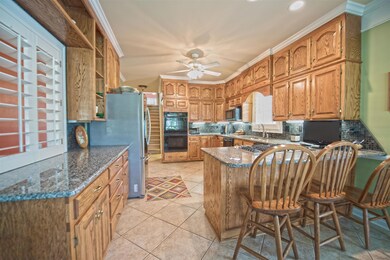 KITCHEN HAS PLENTY OF CABINET STORAGE! GRANITE COUNTERS WITH TILE BACK SPLASH! 1310 SHAGBARK TRAIL MURFREESBORO, TN 37130