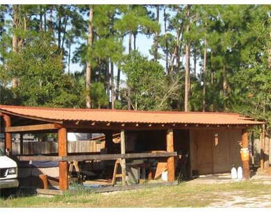 Land/Lot. Pole Barn/Stable with 4 run in stalls an