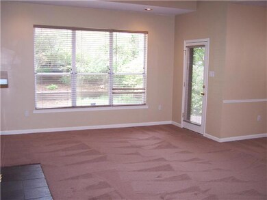 This room has recessed lighting and beautiful vaul