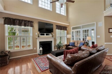 2 Story Family Room with custom Shutters, Gas FP,