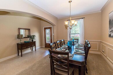Elegant entry and formal dining to your left.