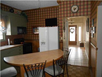 Spacious entry way leads into the remodeled kitche