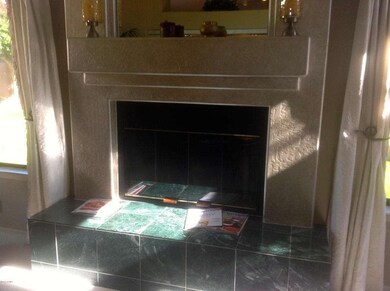 Granite Tiled Fireplace in Family Room