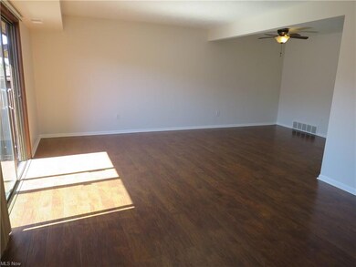 Freshly painted and engineered hardwood floors greet you as you enter this unit with an open floor plan.