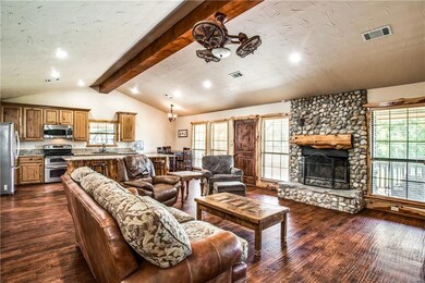 Open floor plan with view of living, kitchen, and 
