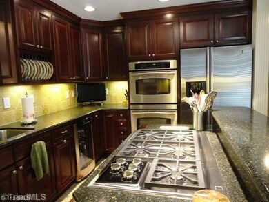 Kitchen. Stainless steel appliances, Wolf - 5 burner gas range, Double ovens.