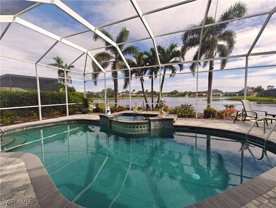 View of swimming pool with a patio, a water view,