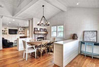 Formal dining room with a unique Reclaimed barn wo