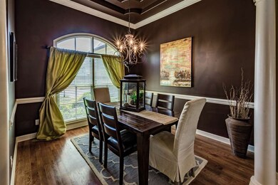 Perfect Space For Formal Dining With Hardwood Floo