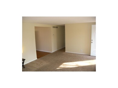 Living room, dining room to the left, hallway to a