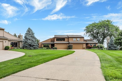Shared driveway with private turn around and attached two car garage