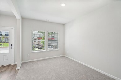 Unfurnished room featuring baseboards