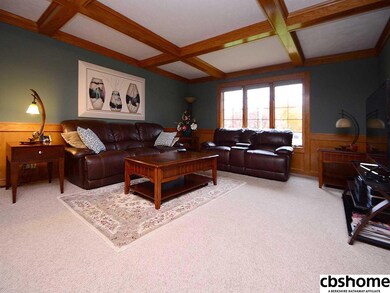 Beautiful coffered ceiling, gas log fireplace shared with office,