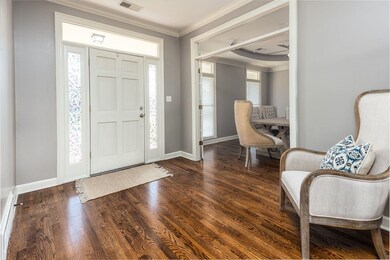 Newly refinished nail-down hardwood floors!