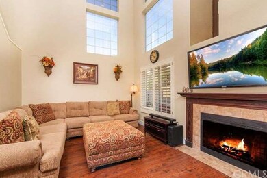 Open Living Room with Cozy Fireplace and capabilit