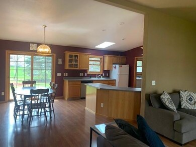 Living area, kitchen and dining area~