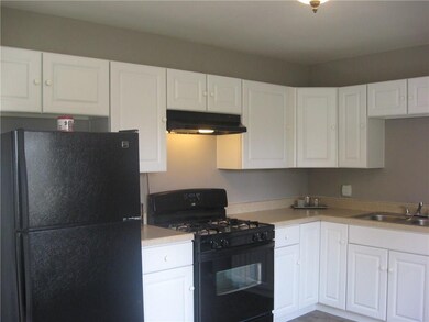 The Kitchen has been completely updated with new cabinets, flooring, counters, and appliances