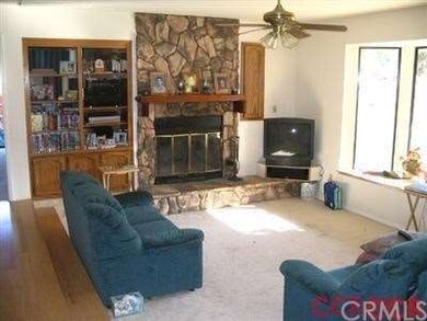 Wood burning fireplace, with built ins, and a bay 
