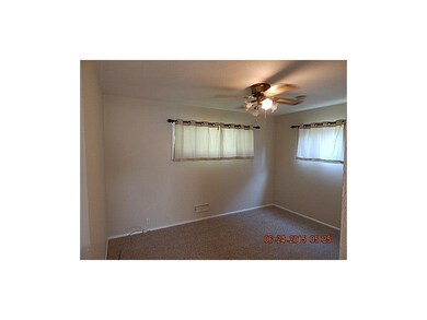Master bedroom with ceiling fan, thermal windows, 